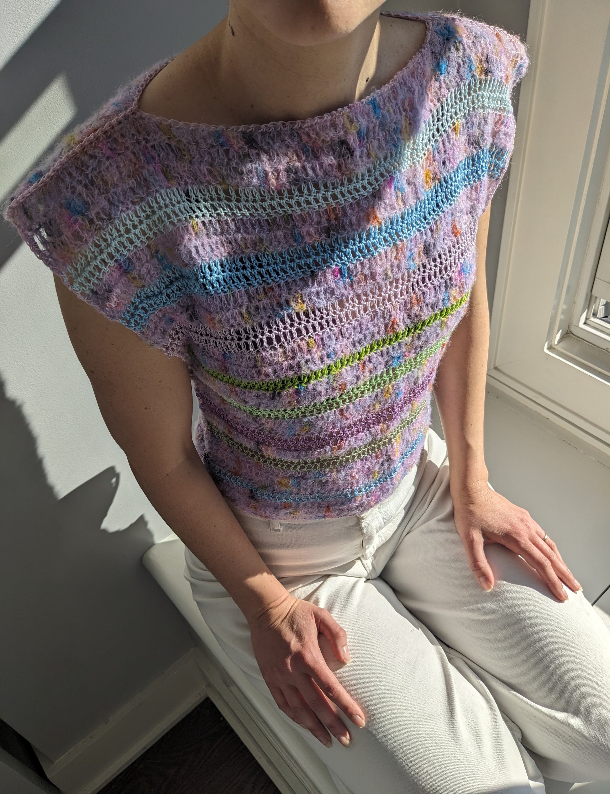 Model wearing the Surena crochet cloud top in lilac.