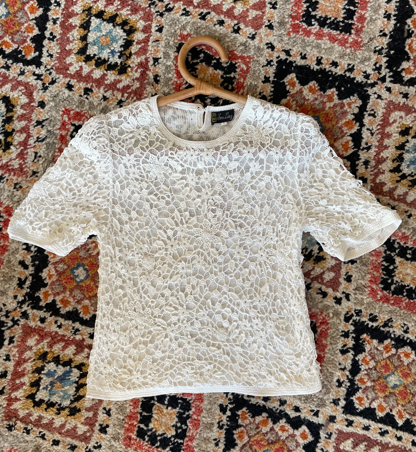 White crochet beaded top laid, from surena crochet preloved collection