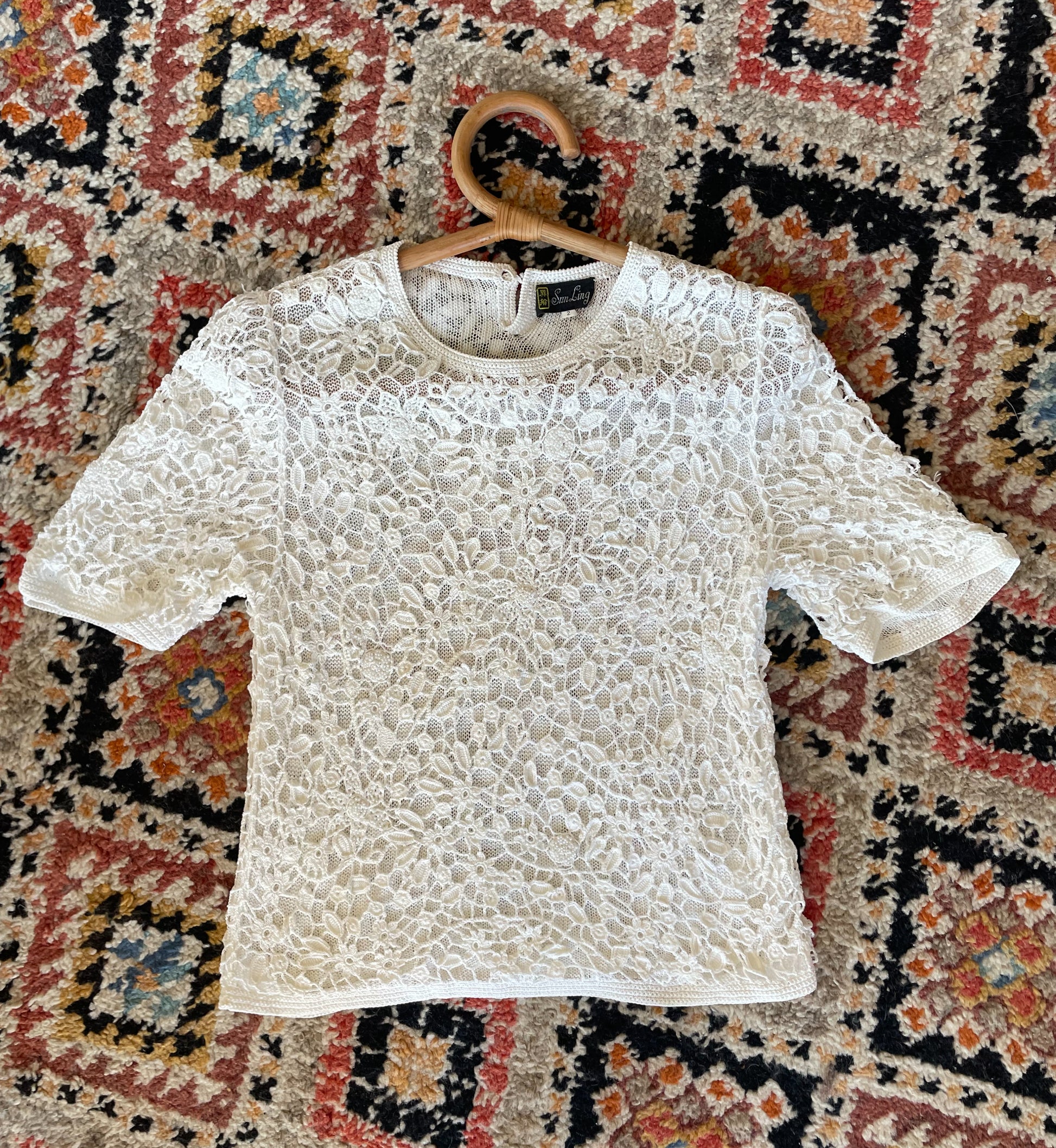 White crochet beaded top laid, from surena crochet preloved collection
