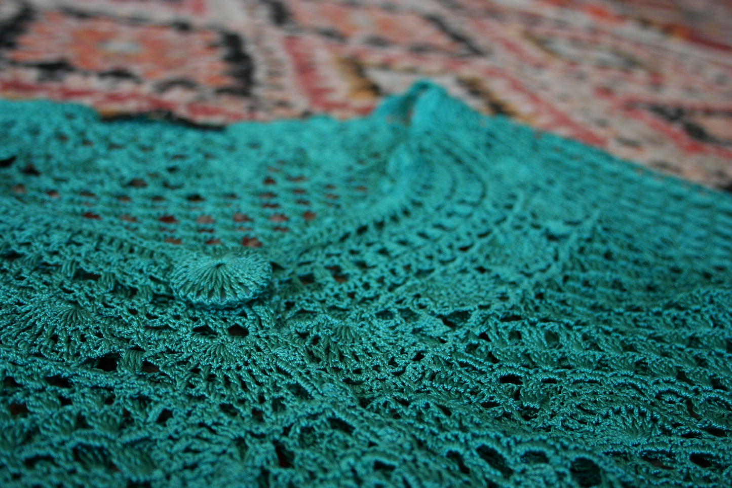 Detail of the preloved turquoise boho crochet vest