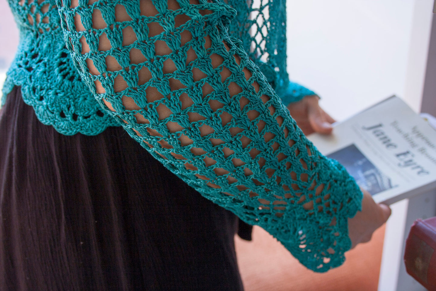 Detail of the preloved turquoise boho vest sleeve