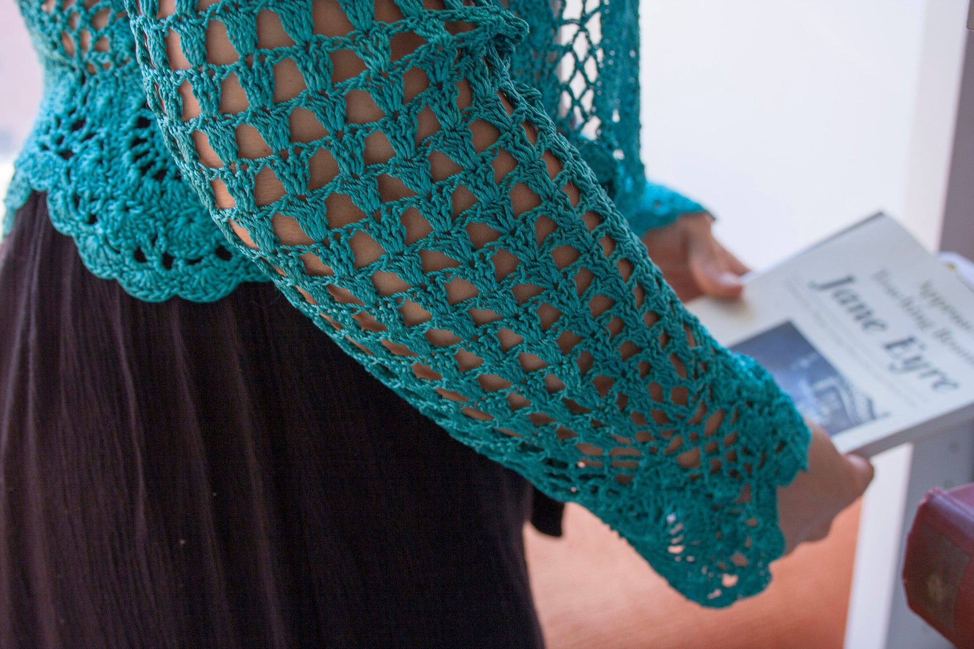 Detail of the preloved turquoise boho vest sleeve