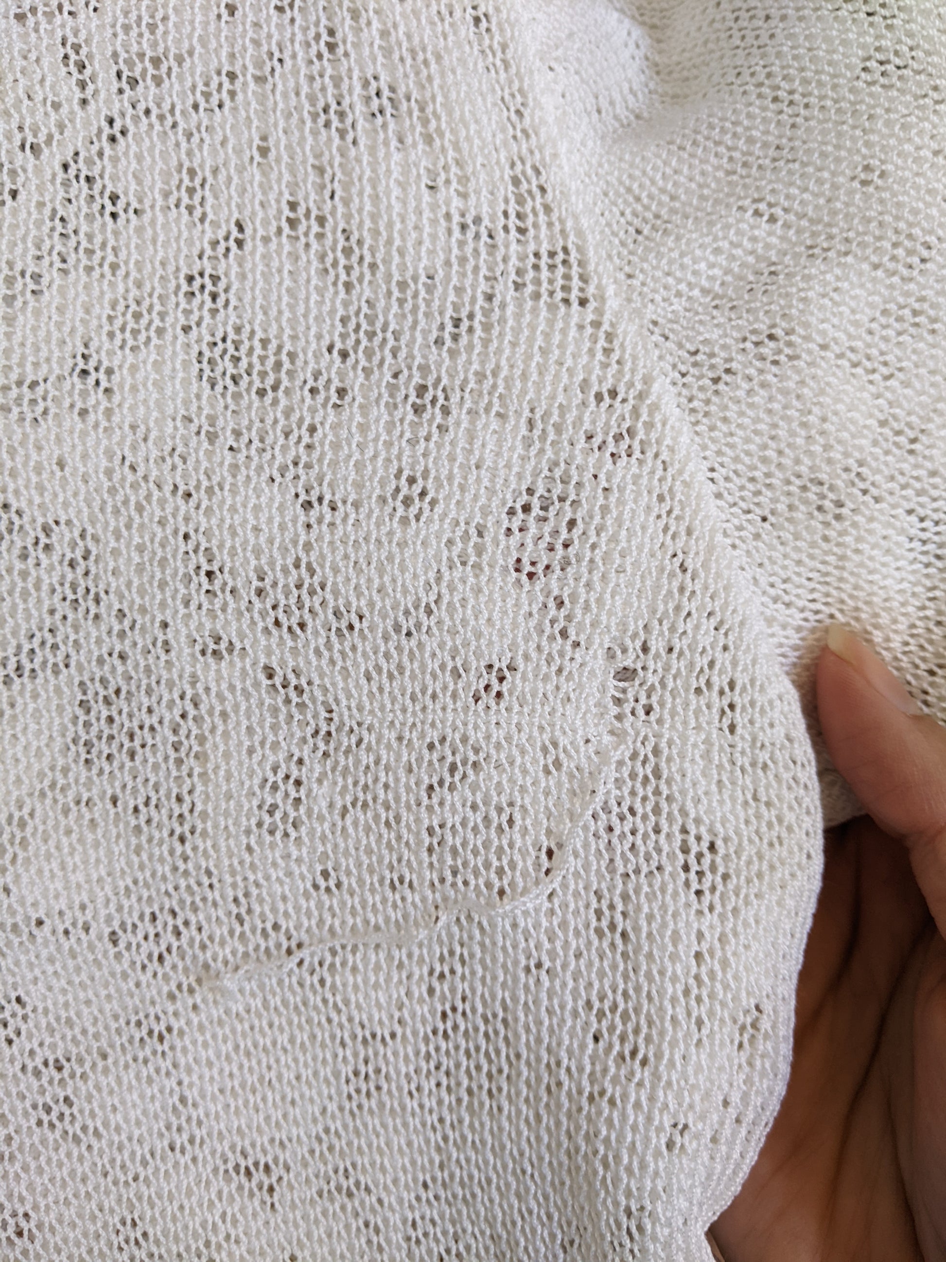 Small flaw detail on the Surena crochet "preloved" white beaded top.