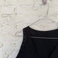 Detail of the Sureña Crochet nena vest in black 