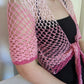 Detail of the Surena crochet sirena croche top in "kiss" pink color palette, handmade with cotton yarn