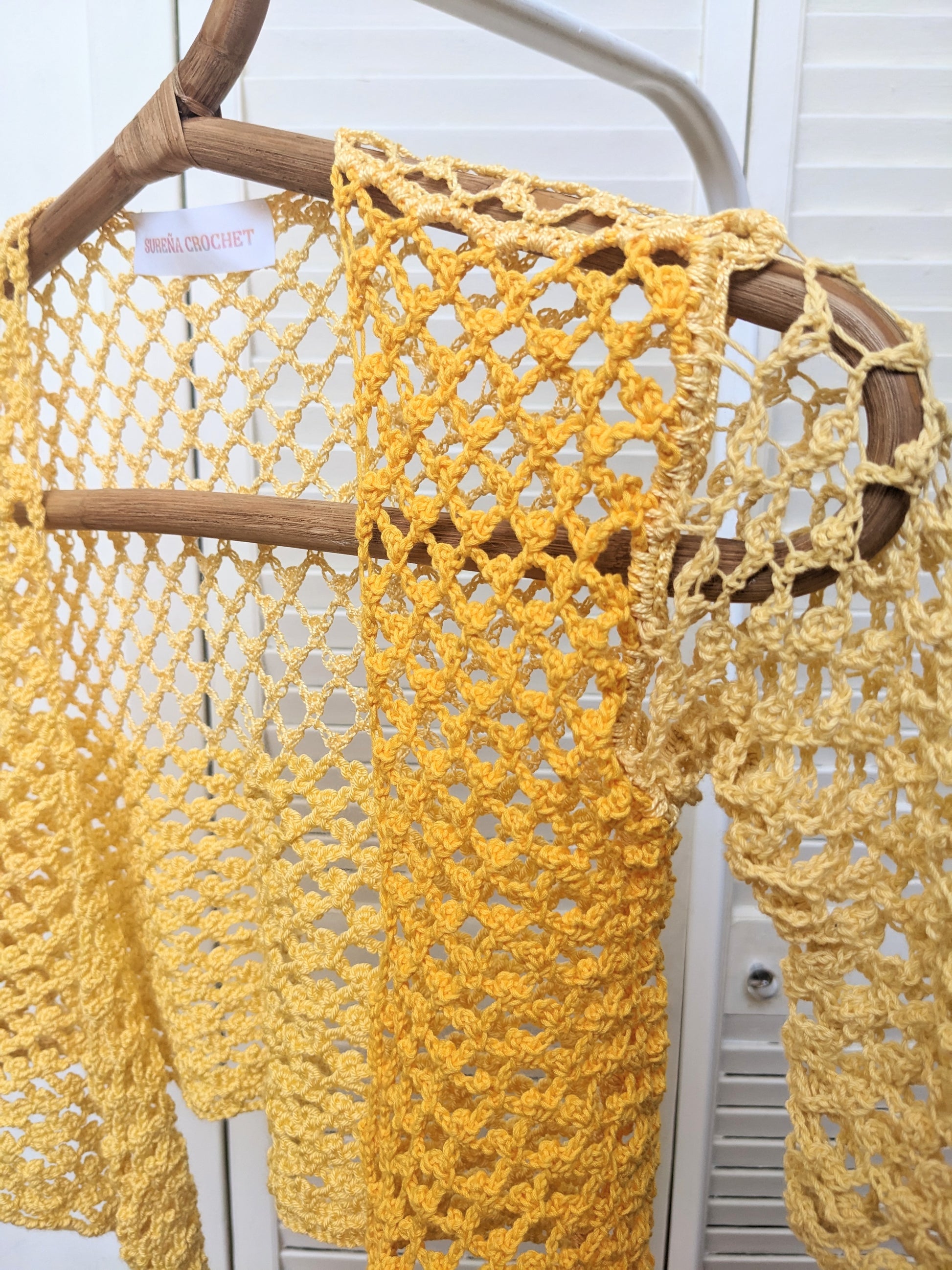 Detail of the surena crochet sirena crochet top in "sunny" yellow color palette