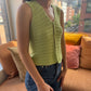 Model wearing the Surena Crochet Nena vest crochet pattern in lime green 