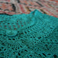 Detail of the preloved turquoise boho crochet vest