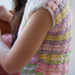 Detail of the preloved pastel rainbow crochet mini top