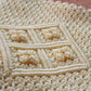 Detail of the second hand vanilla macrame bag