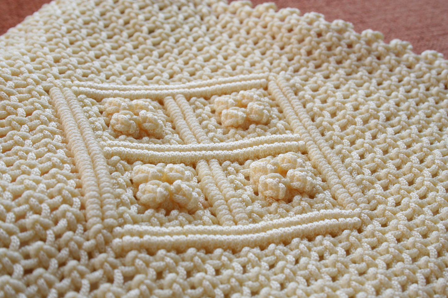 Detail of the second hand vanilla macrame bag