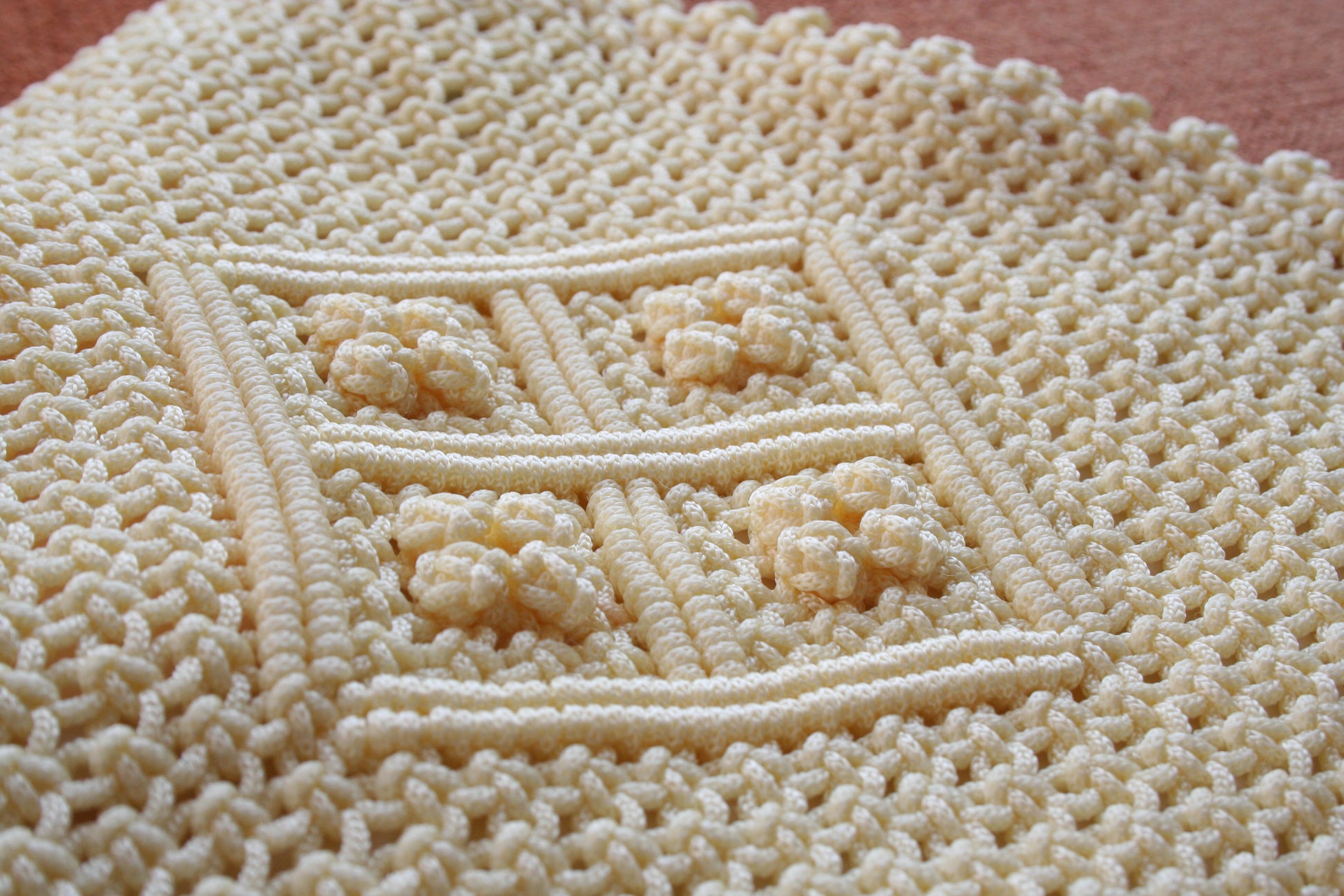 Detail of the second hand vanilla macrame bag