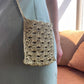 Model wearing surena crochet crossbody raffia bag 